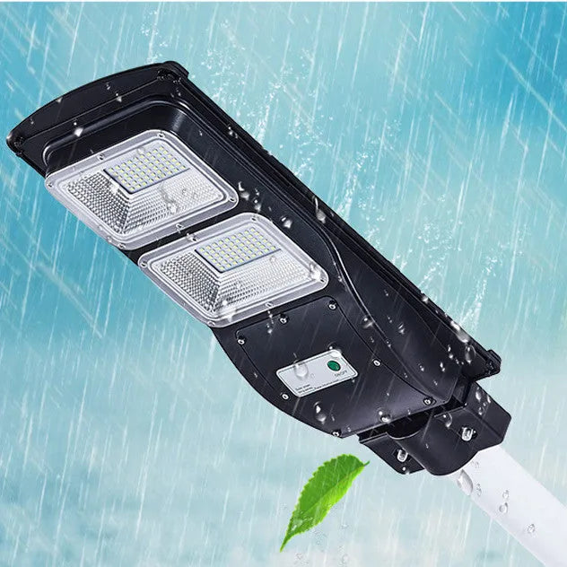 Integrated solar-powered 60W LED street light unit with remote control for outdoor gardens.