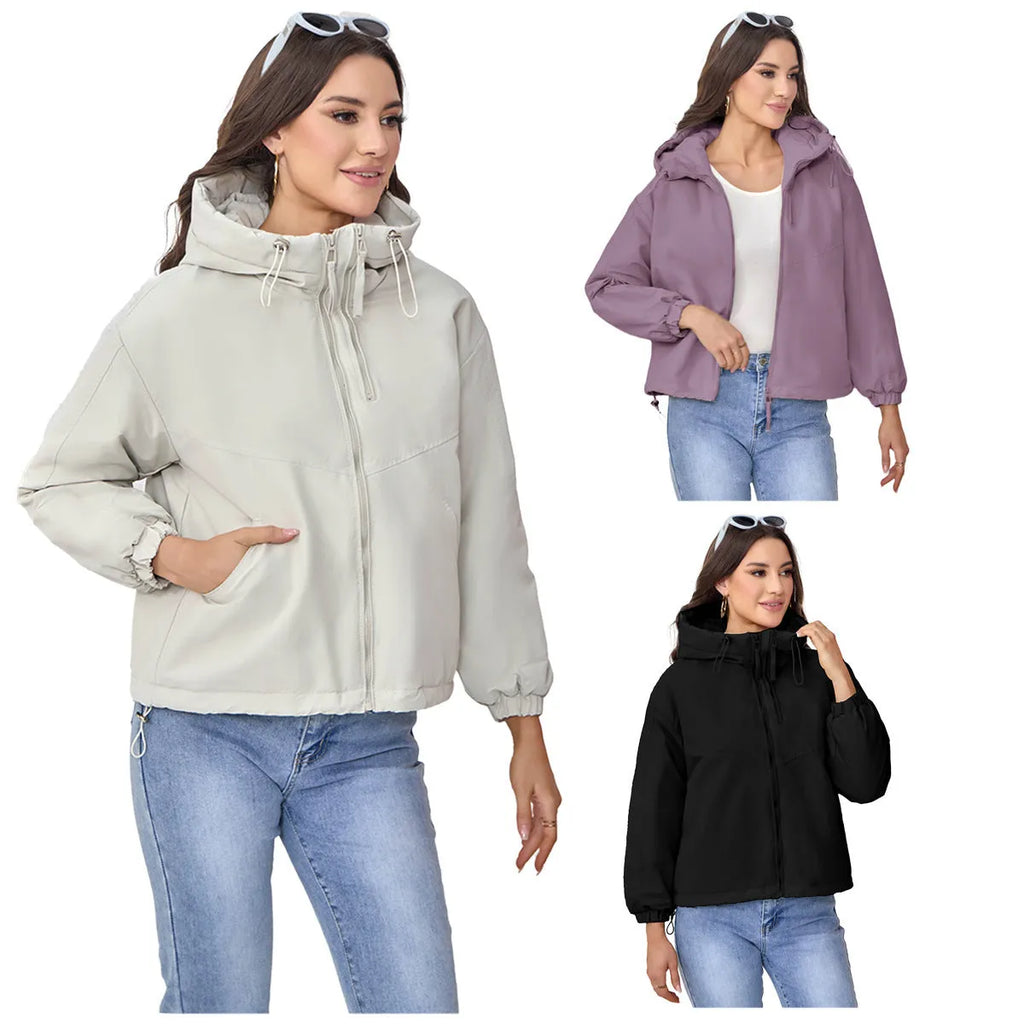 Women's grey loose-fit hooded polyester jacket with full zip and long sleeves.