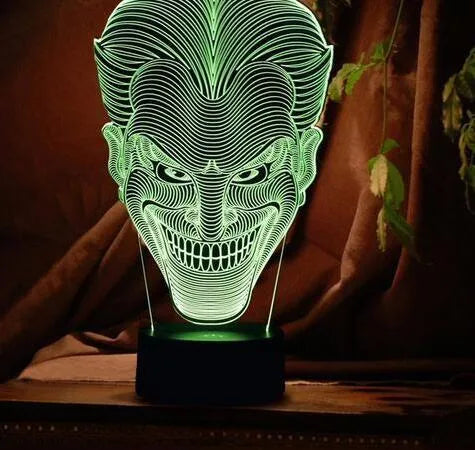 USB-powered 3D acrylic LED table lamp showing colourful gradient lighting on a desk.