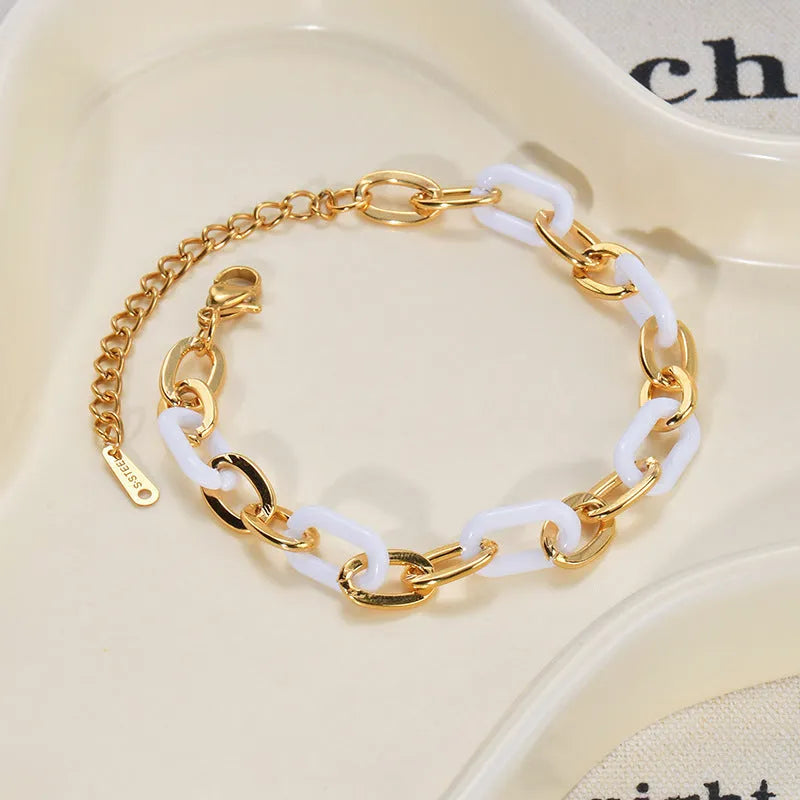 Women's stainless steel and resin bracelet with a double-layer loving heart design.