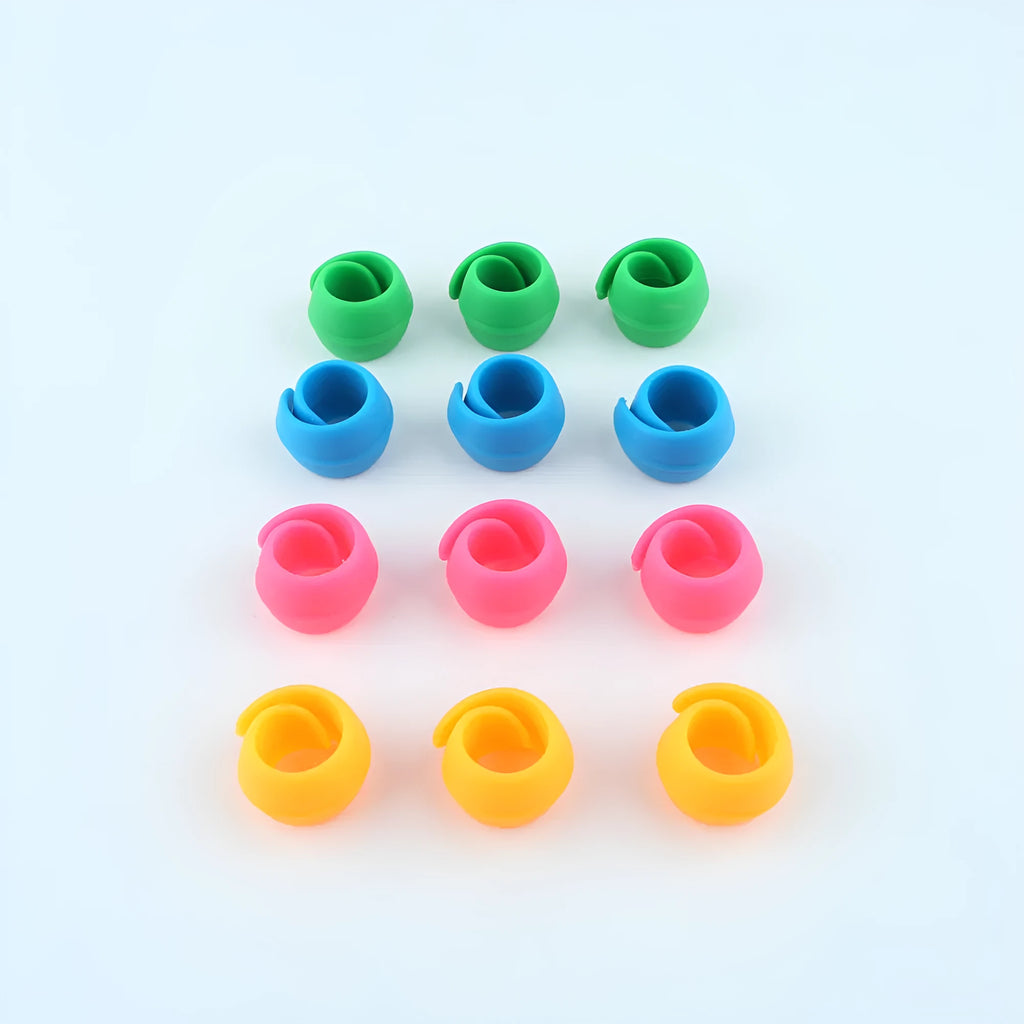 Set of 14 silicone sewing spool fixing clips in 20mm size in circle blue, green, orange, and pink