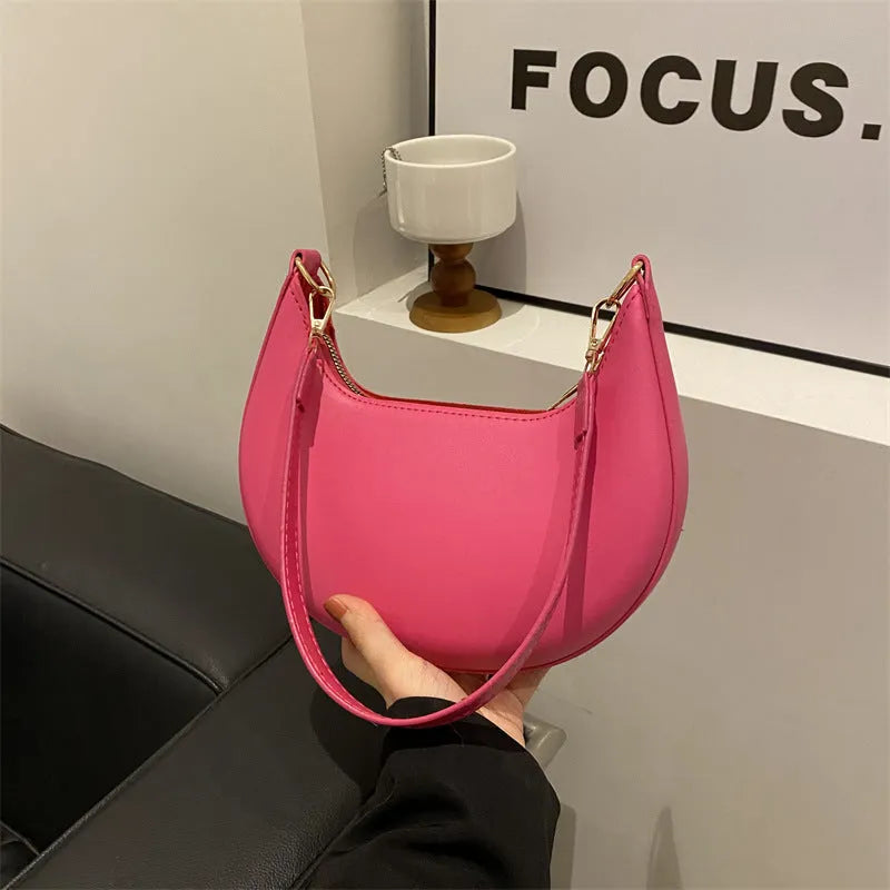 Round green PU leather one-shoulder underarm bag with sewing line details and a shoulder strap