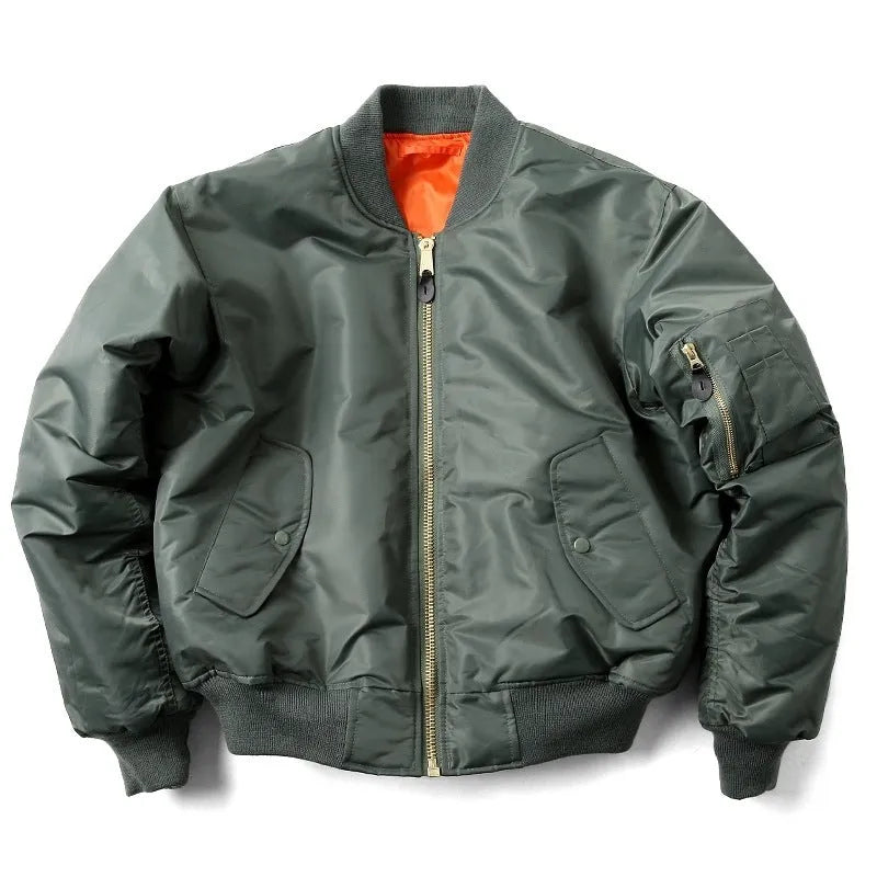 Man wearing a reversible army green nylon pilot-style cotton-padded jacket, showing loose fit.
