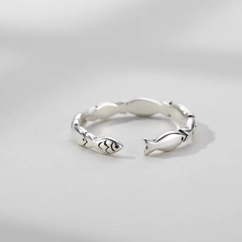 Adjustable sterling silver fish ring with open mouth design and electroplated finish