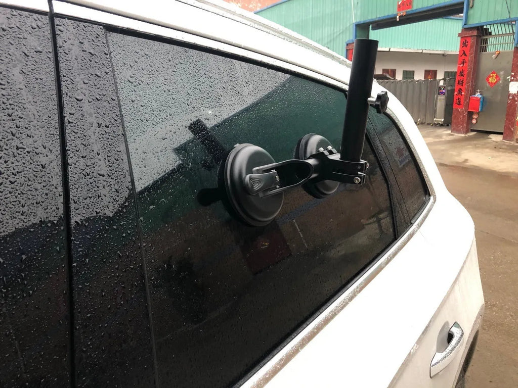 Black off-road car windscreen sucker base with a round glass suction cup and heavy rubber disc.