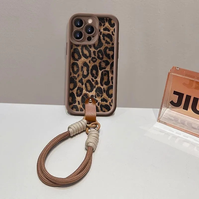 Brown leopard print silicone phone case with attached lanyard for iPhone models