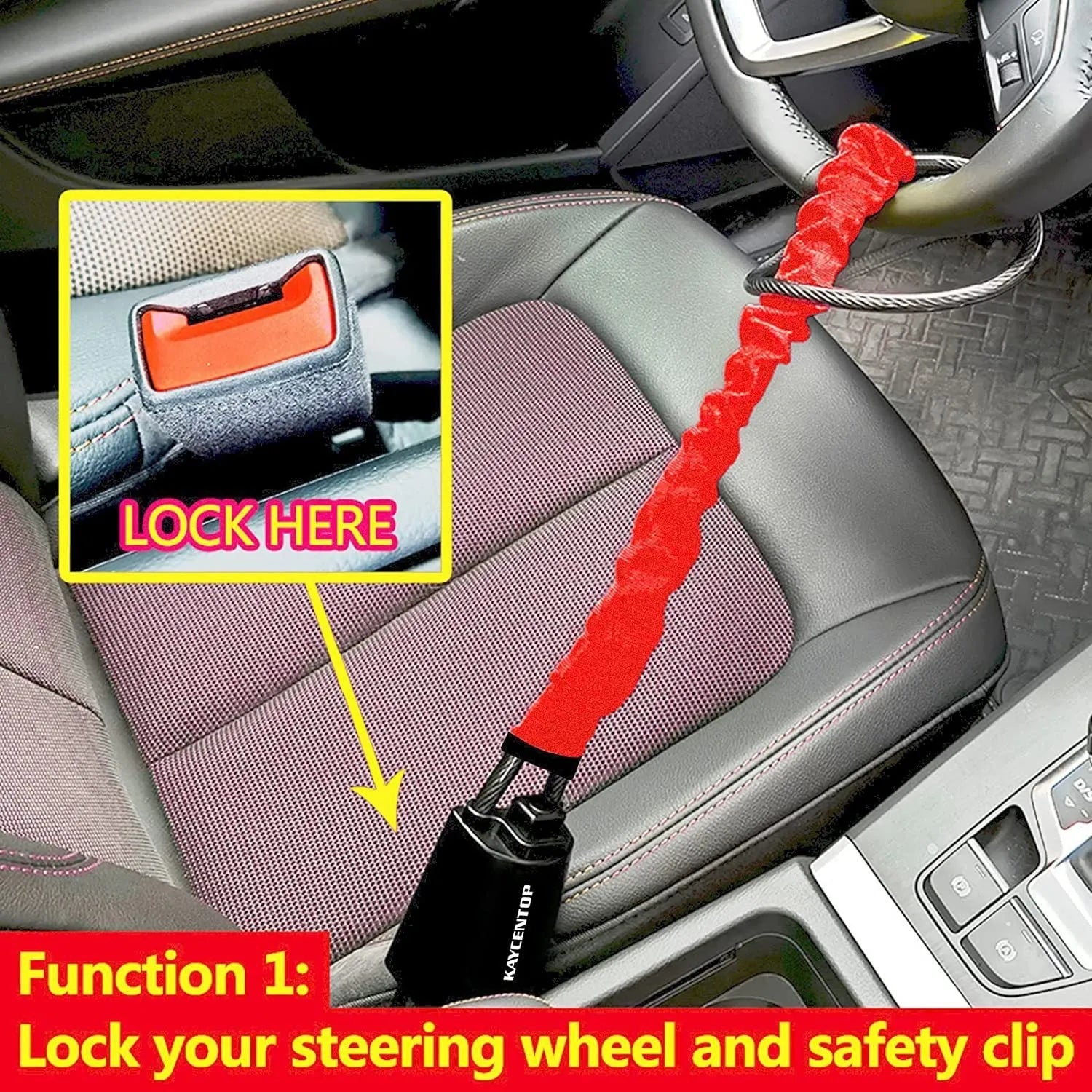 Red iron car steering wheel lock with brass core for General Motors vehicles on a steering wheel.