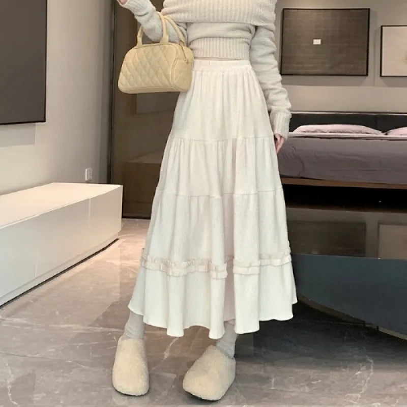 Korean style A-line corduroy skirt with elastic waistband in milky white colour.
