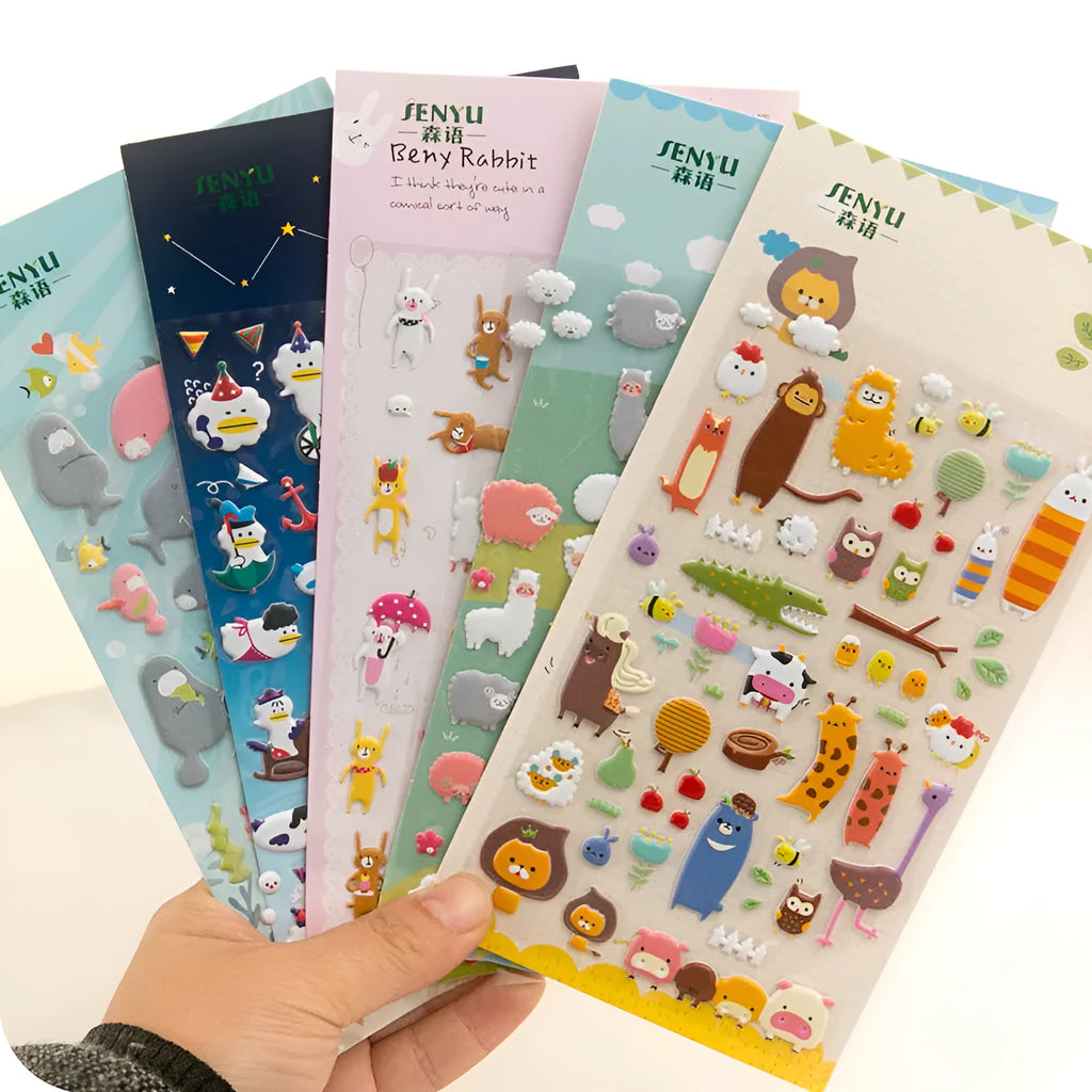 Cartoon three-dimensional bubble stickers showing raised puffy designs including alpaca, cat, dinosaur, and bunny themes