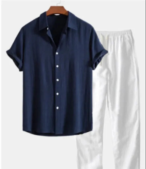 Men's slim fit casual suit set with floral print on cardigan top and trousers, shown in a blue colour option.