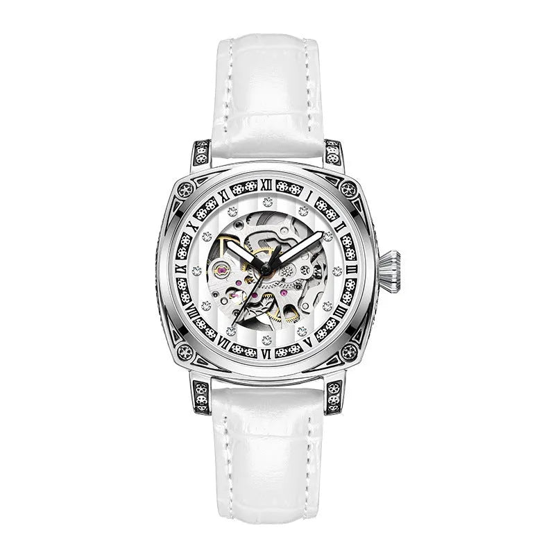 Mechanical watch with luminous hands and a leather strap on a wrist, showing black case variant.