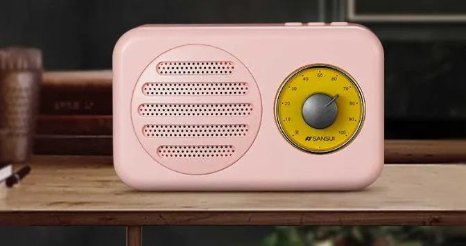 Portable Bluetooth speaker in wood grain finish with FM radio and micro USB cable
