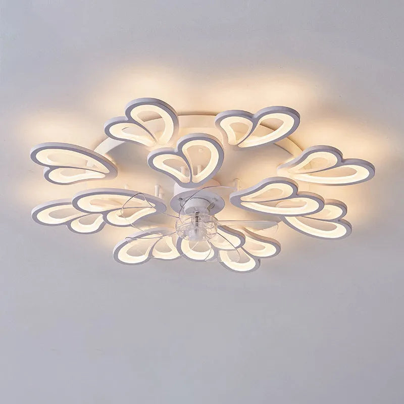 Modern white ceiling fan light with six-blade design and integrated light fitting on a room ceiling.