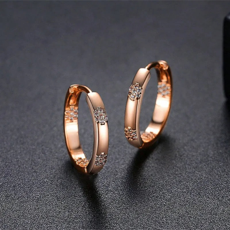 Women's geometric inlaid diamond pattern earrings in gold colour with electroplated copper construction