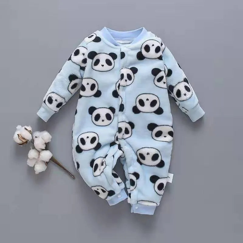 Baby wearing a long sleeve flannel romper with a printed panda pattern in pink and blue.