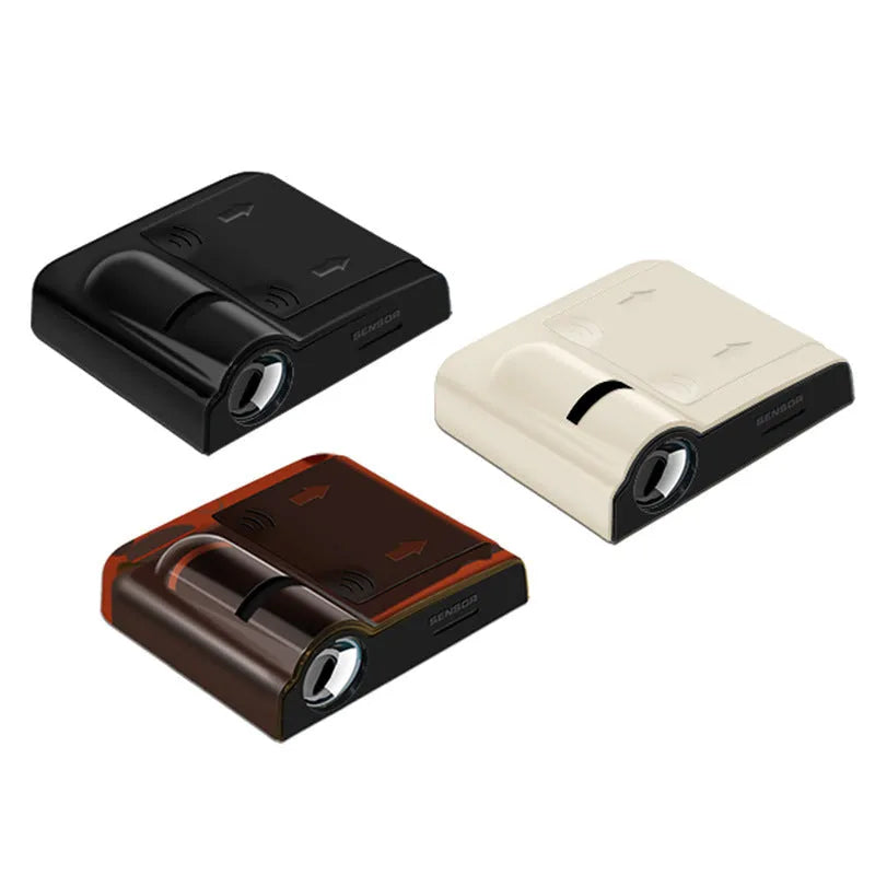 A small black or beige ABS plastic car decorative projection lamp, shown with three No. 7 batteries.