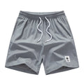 Man's pair of grey straight-leg summer shorts with a drawstring elastic waistband.