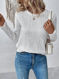 White loose fit women's long sleeve round neck t-shirt laid flat