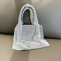 Silver handbag with rhinestone decoration made from cotton thread, open pocket design