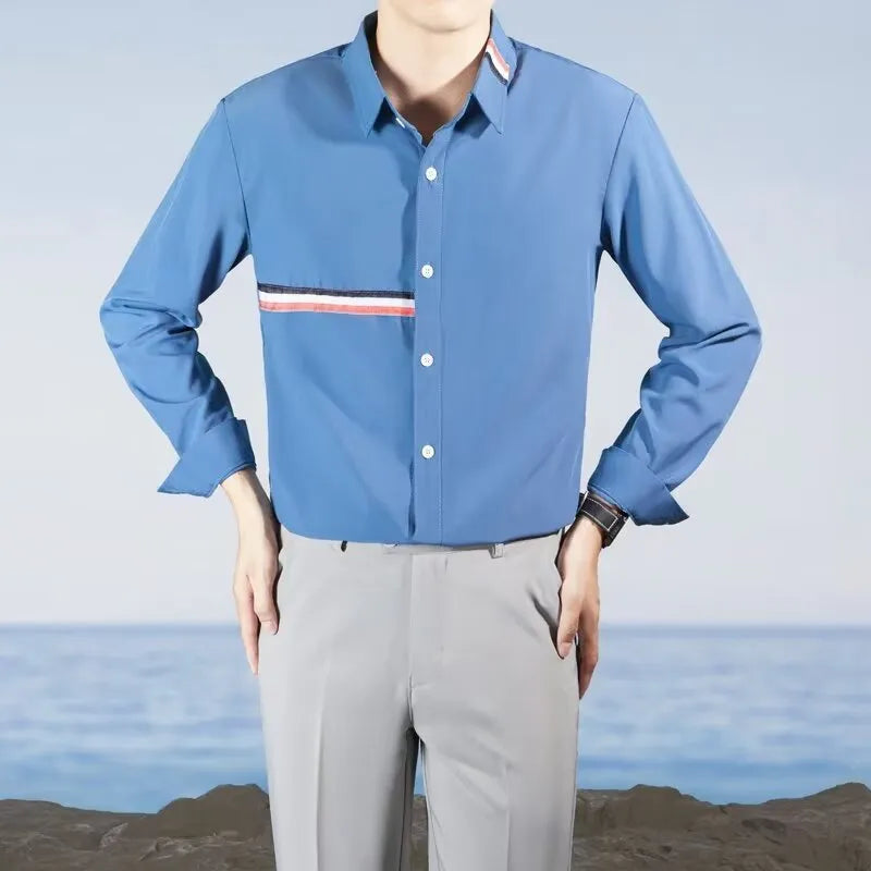 Hong Kong style loose-fit cotton blend cardigan shirt in light blue, showing non-ironing casual design.