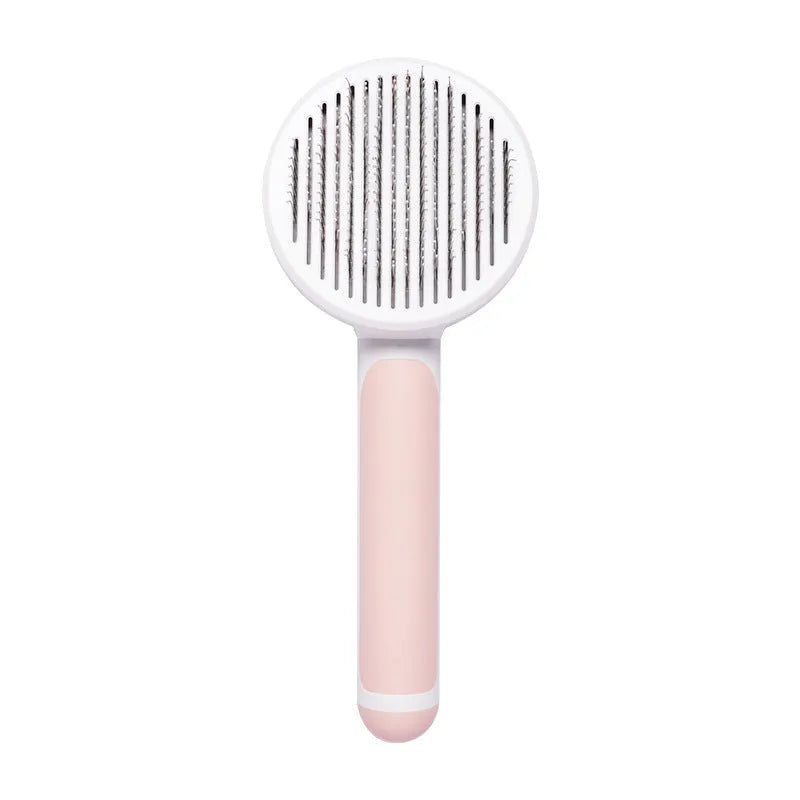 Pumpkin-coloured hand-held pet brush with curved stainless steel teeth for grooming cats and dogs