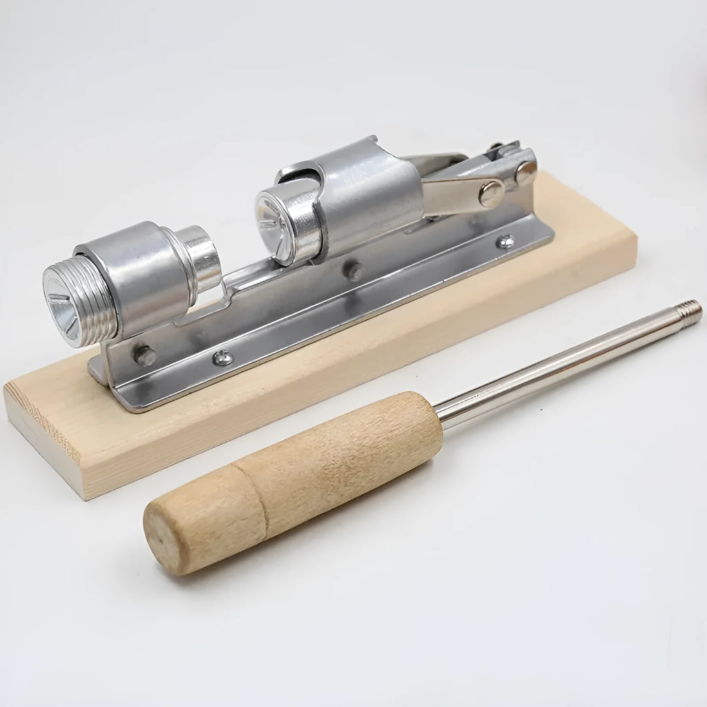 Mechanical walnut cracker with wood handle and aluminium parts, hand-crank design
