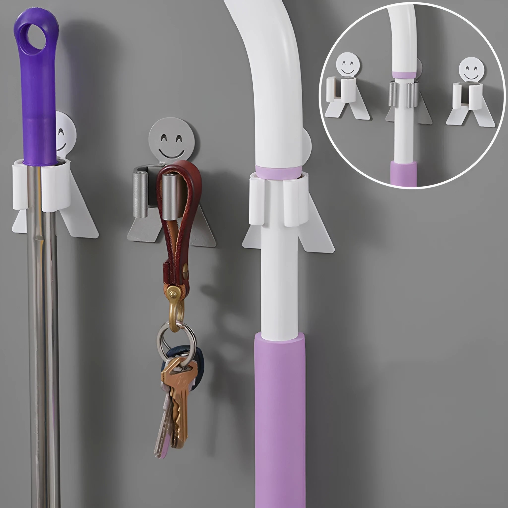 White bathroom toilet mop hook with adhesive backing for wall mounting, holding a toilet brush handle