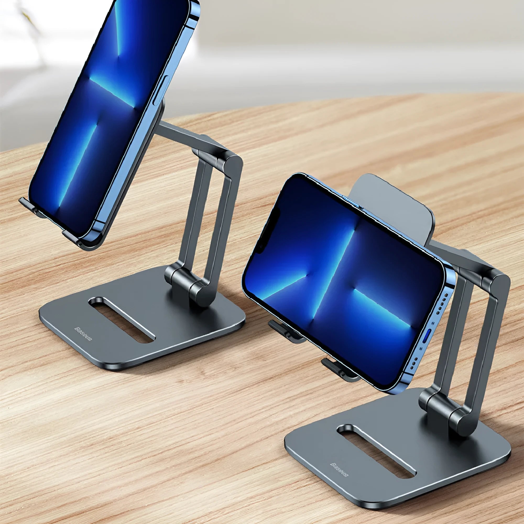 Deep space grey aluminium alloy folding stand for phones and tablets shown in two size options