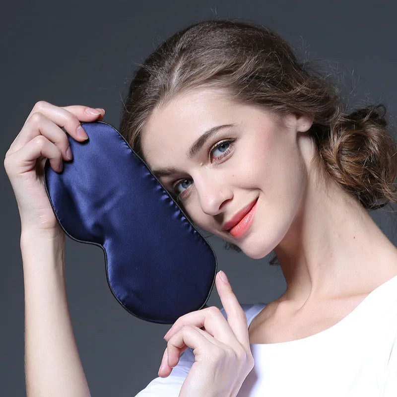 Double-sided mulberry silk sleep mask with embroidered print in various colours.