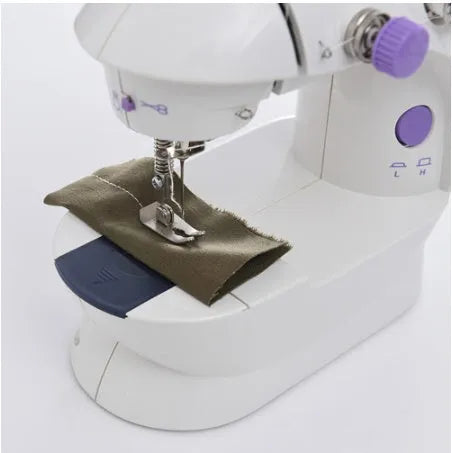Electric mini household sewing machine showing compact 20cm size with power supply and accessories