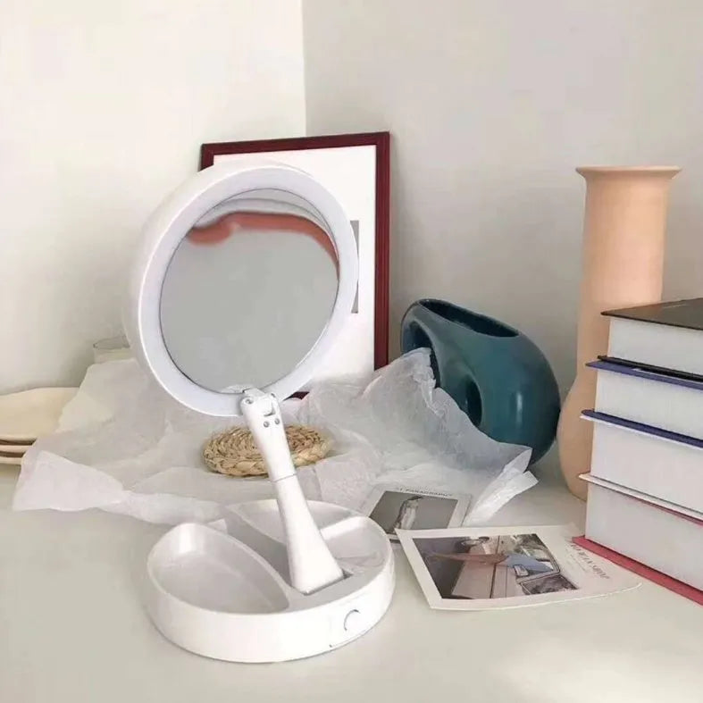 White acrylic LED vanity mirror with foldable design and USB charging port