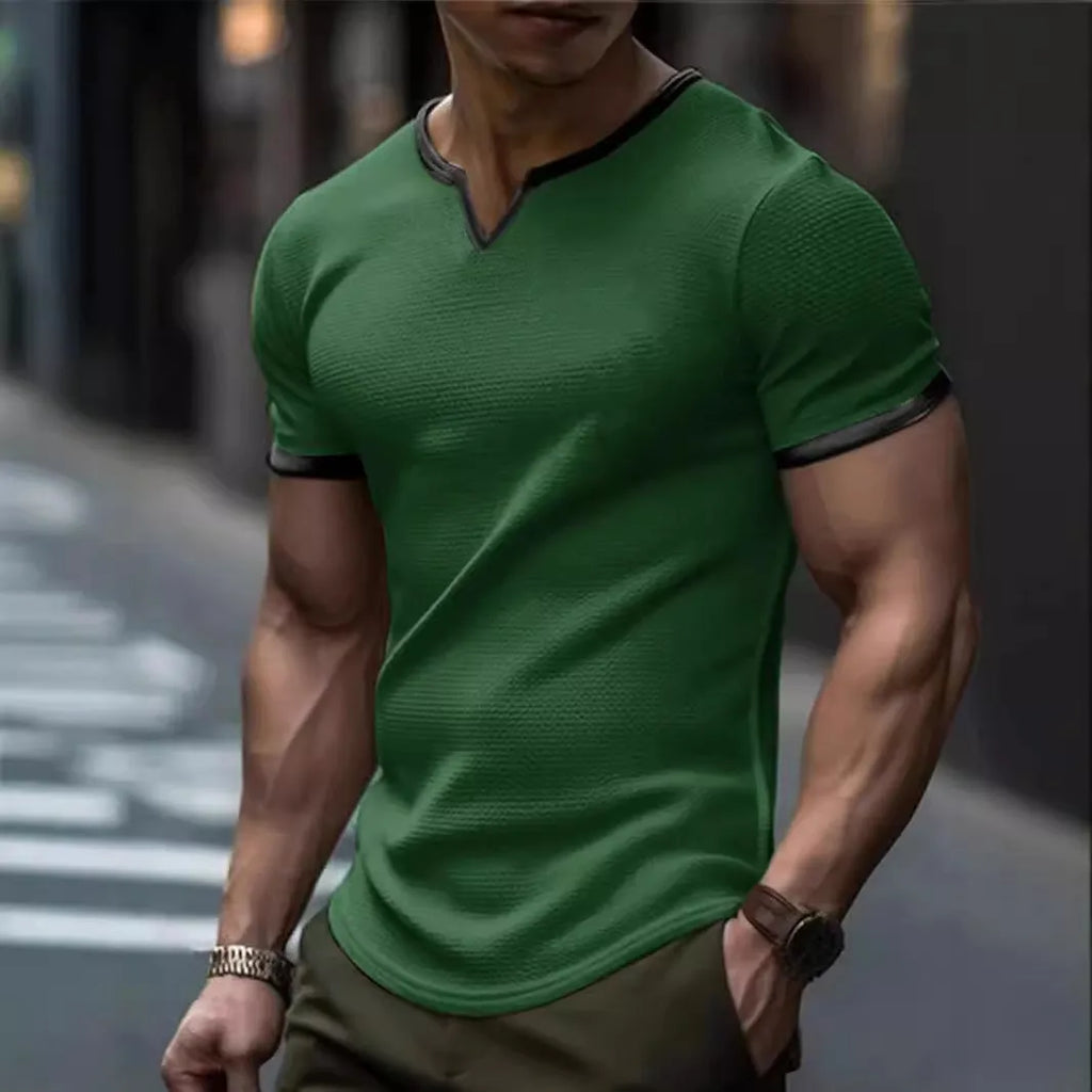 Colour-block V-neck short sleeve t-shirt in polyester waffle fabric on a neutral background.