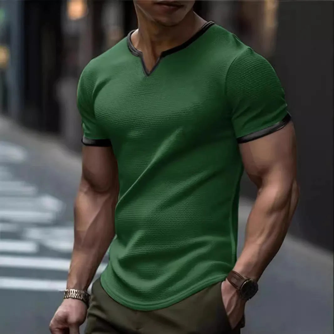 Colour-block V-neck short sleeve t-shirt in polyester waffle fabric on a neutral background.