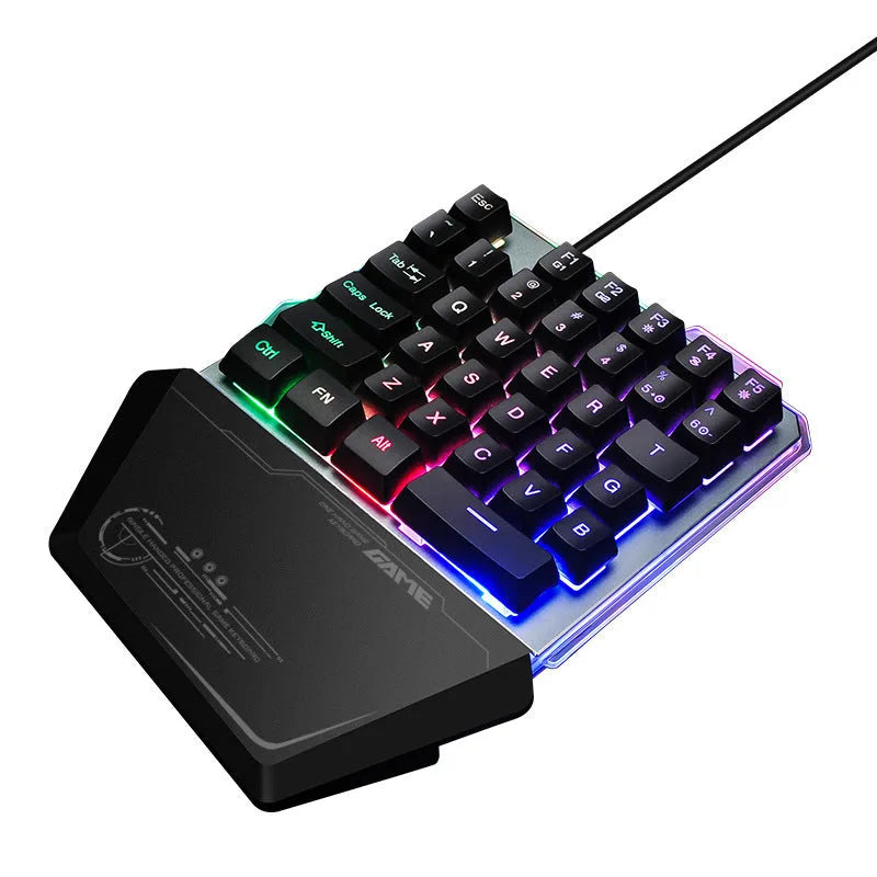 Black Robotic G40 Flow one-handed mechanical keyboard with RGB backlit keys on a desk.
