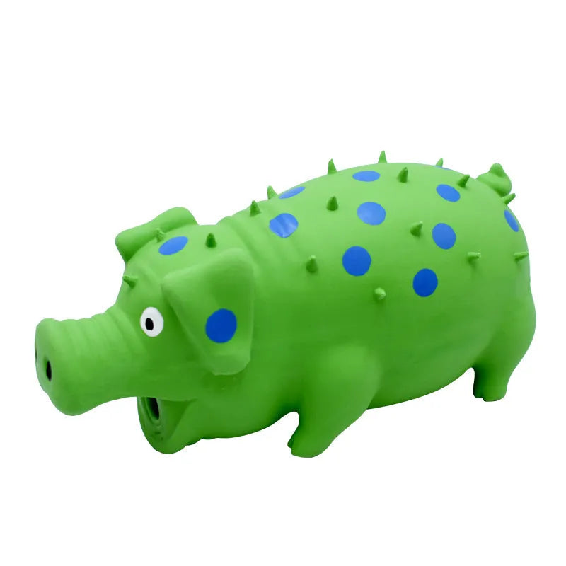 Blue latex pig-shaped dog chew toy with textured surface and squeaker on a wooden floor.