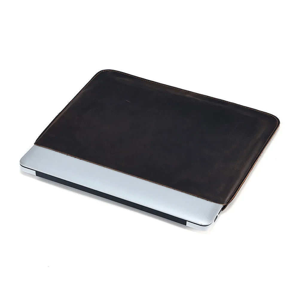 Brown genuine leather horizontal computer bag liner organiser with a laptop inside