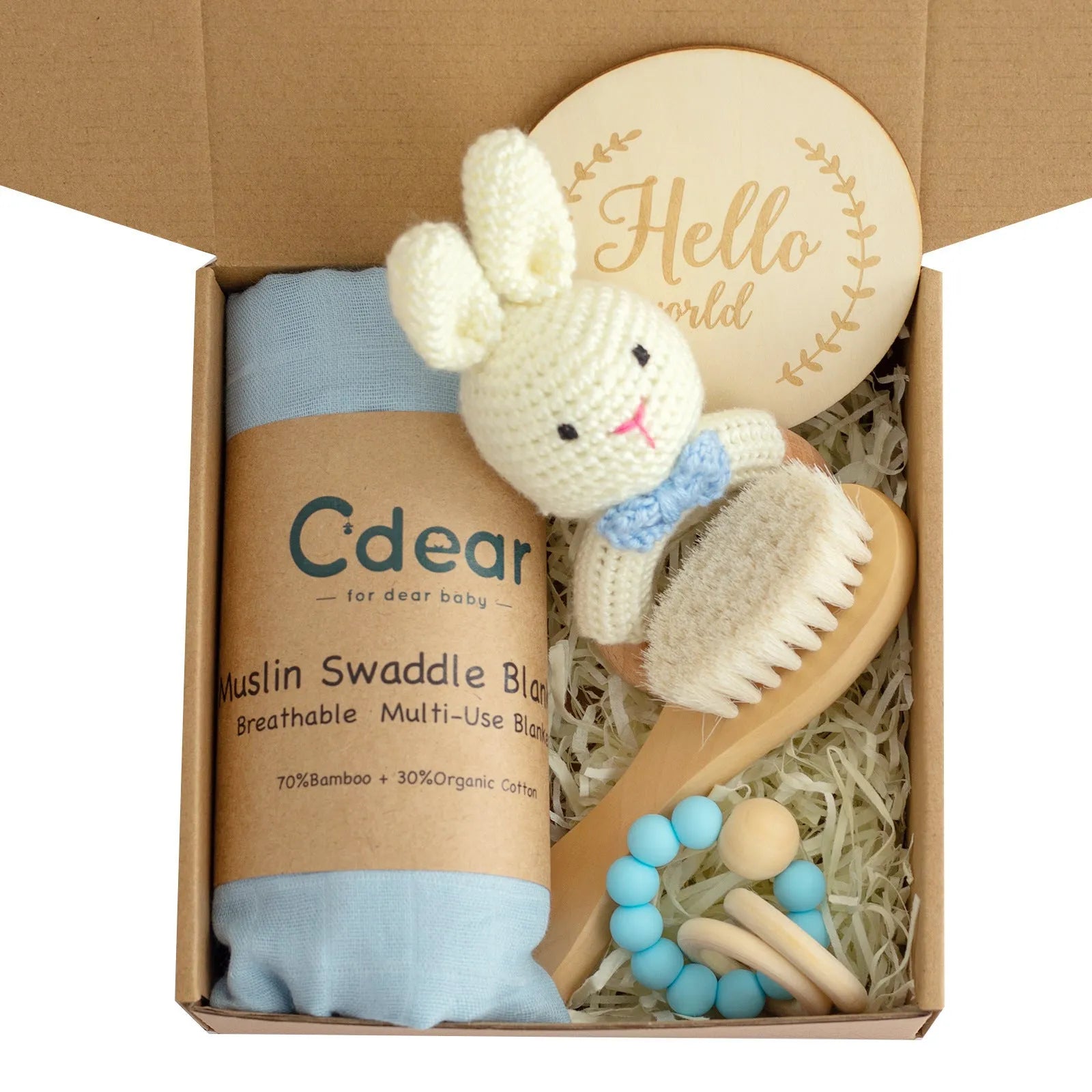 Baby teething toy gift set showing gauze blanket, wooden bell, gum teether, tire brush, and milestone on white background