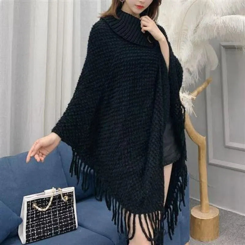 Women's casual plush triangular shawl cape with tassels in wine red colour.