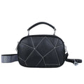 Round PU leather crossbody bag with patchwork design showing decorative stitching