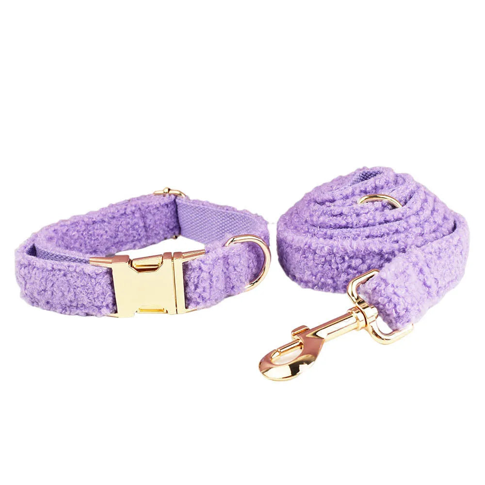 Purple cloth dog accessory set showing collar, leash, bow, and vest for small dogs