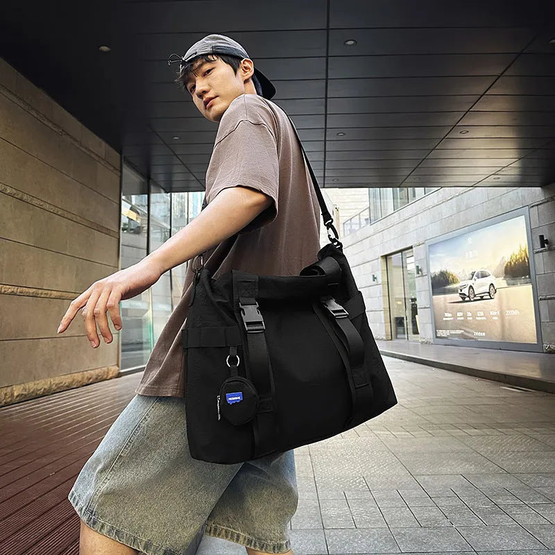 Men's grey Oxford cloth shoulder bag showing main compartment and attached coin purse