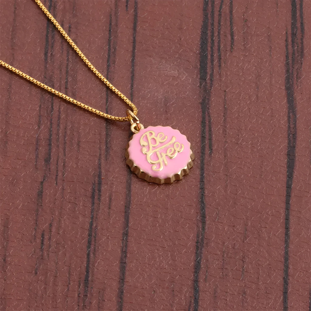 Copper Be Free bottle cap pendant necklace with a gold-plated finish on a 40cm box chain.