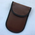 Black signal-blocking Faraday pouch for car key fobs, size 20x10 cm, lying flat on a surface