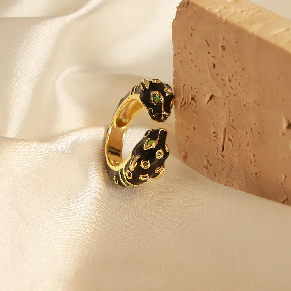 Women's black cheetah open geometric ring made from copper in size 7.
