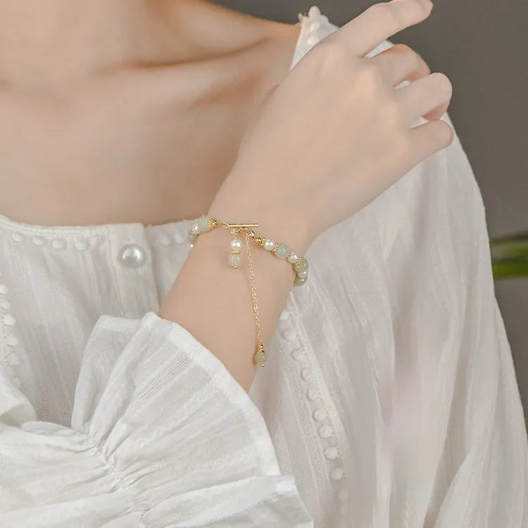 Hetian Jade women's bracelet with natural jade pearl pendant and gold electroplated alloy metal