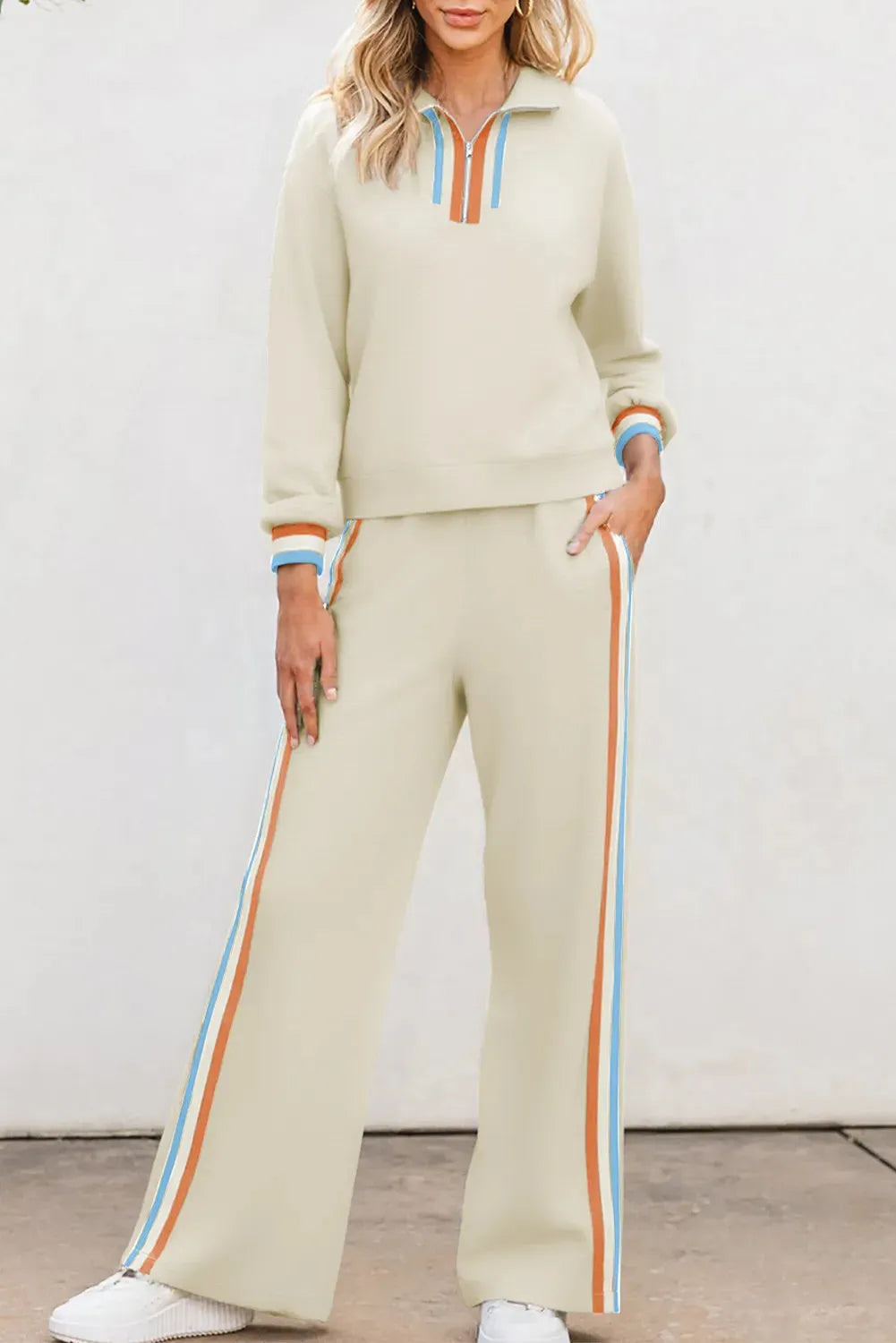 Apricot striped patchwork quarter zip pullover and loose pant set on model, women's two-piece loungewear