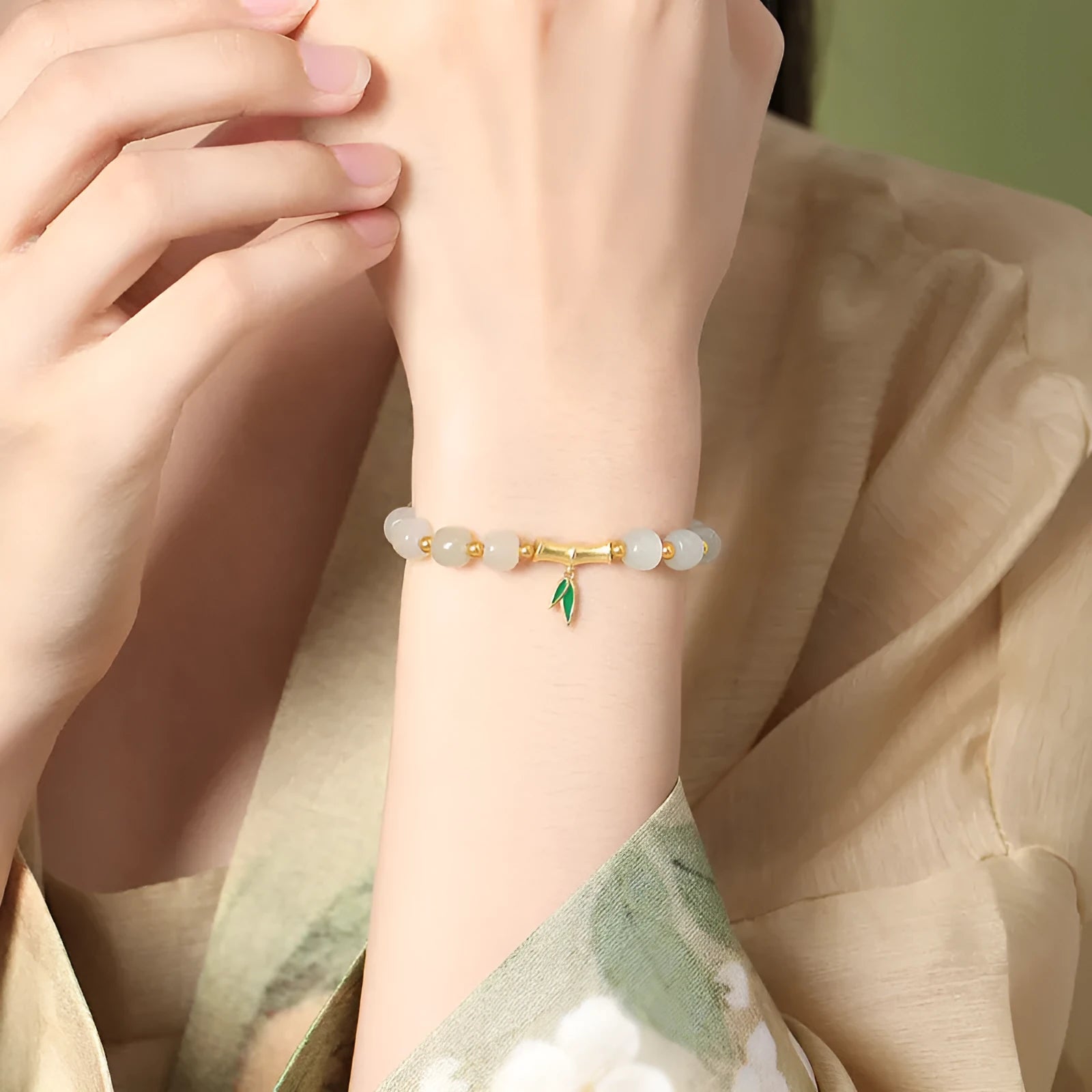 S925 sterling silver bracelet with 6mm natural Hetian jade beads and bamboo leaf design elements