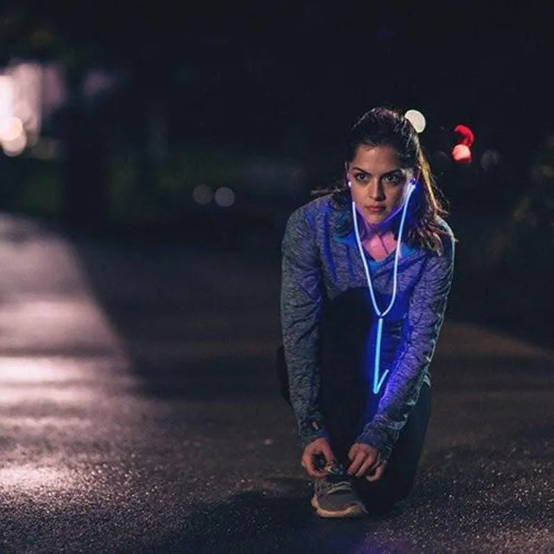 Blue LED light up earphones with 3.5mm plug and remote control, showing aluminium alloy ear shells.