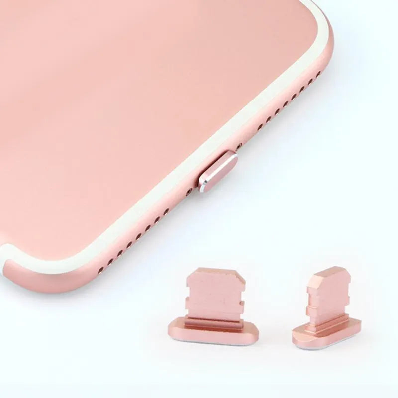 Aluminium alloy charging port dust plug for iPhone in various metallic colours including gold and rose gold.