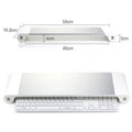 Silver aluminium alloy notebook computer heighten base bracket with USB charging port on a desk